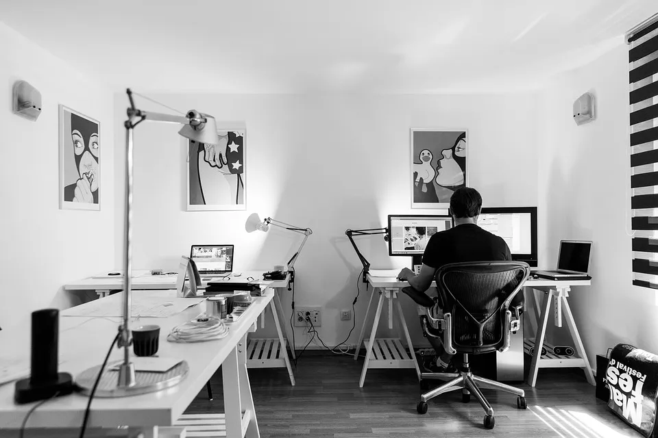 Home office setup with custom built-in shelving and organized workspace